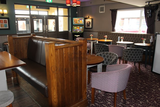 The warm main bar area, used for relaxed reflection